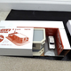 Illustration for article titled Hot Sixty 4th: Unboxing the Tomicarama Police Station